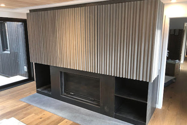 Cozy Up With Unique Concrete Fireplaces