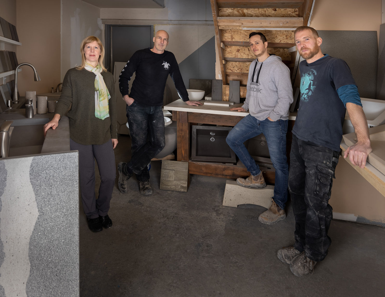 Part of the Versatile Concrete team, Alana, Richard, Lucas, and D’Arcy in the custom concrete workshop. 